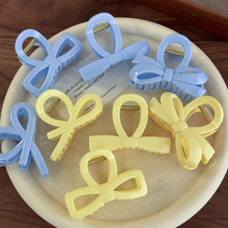 E廠-奶油色系交叉黃藍純色蝴蝶結壓克力抓夾後腦勺盤髮夾髮爪髮飾品女「26784」25.04-2