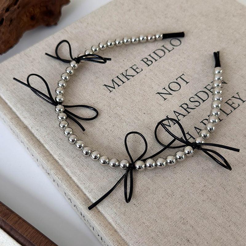 E廠-韓版芭蕾風銀色仿金屬串珠蝴蝶結髮箍小眾高級感甜美壓髮卡頭飾女「25811」24.08-2