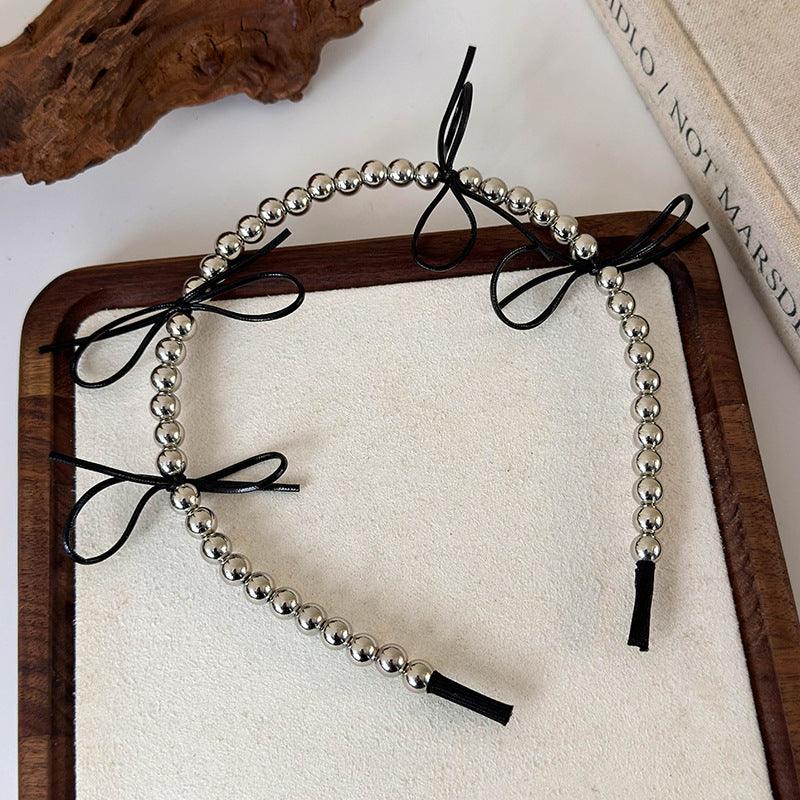 E廠-韓版芭蕾風銀色仿金屬串珠蝴蝶結髮箍小眾高級感甜美壓髮卡頭飾女「25811」24.08-2