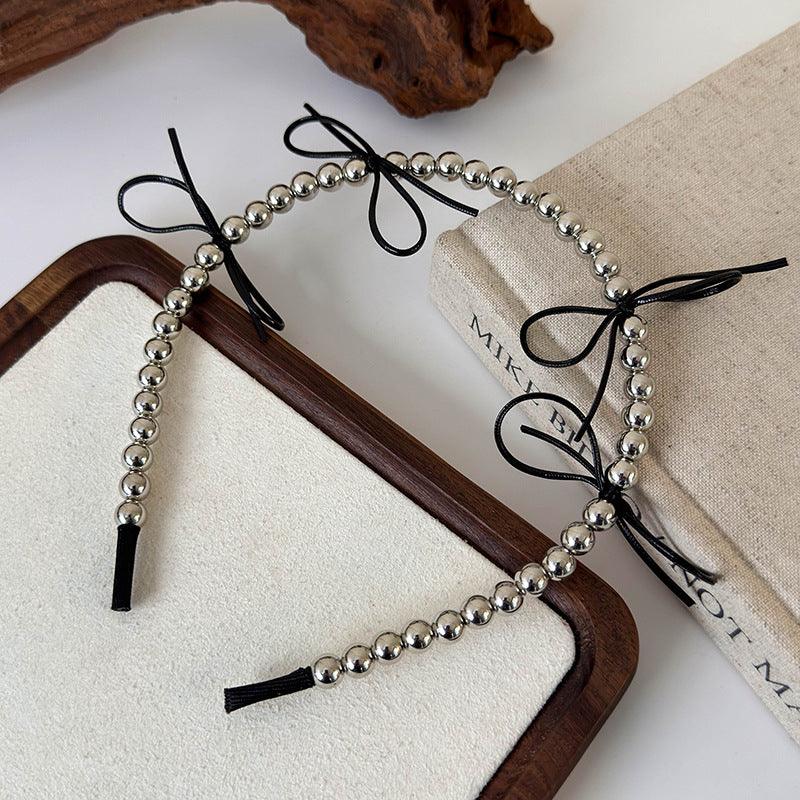 E廠-韓版芭蕾風銀色仿金屬串珠蝴蝶結髮箍小眾高級感甜美壓髮卡頭飾女「25811」24.08-2