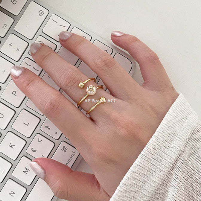 C廠-法式氣質名媛高級感珍珠戒指女百搭純銀疊戴風旋轉四芒星食指戒「JZ-0715」25.10-5