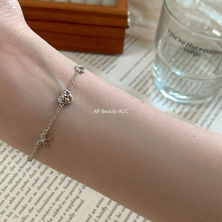 C廠-韓版愛心鹼水結手鍊女甜美小清新蝴蝶結純銀手飾小眾精緻設計飾品「SL-490」25.11-1