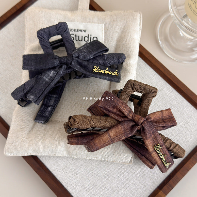 E廠-美拉德格紋蝴蝶結抓夾女高級感大號鯊魚夾子新款盤髮夾後腦勺頭飾「27659」25.11-2