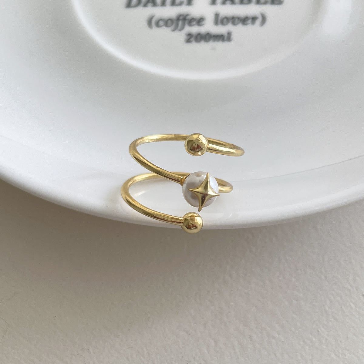 C廠-法式氣質名媛高級感珍珠戒指女百搭純銀疊戴風旋轉四芒星食指戒「JZ-0715」25.10-5