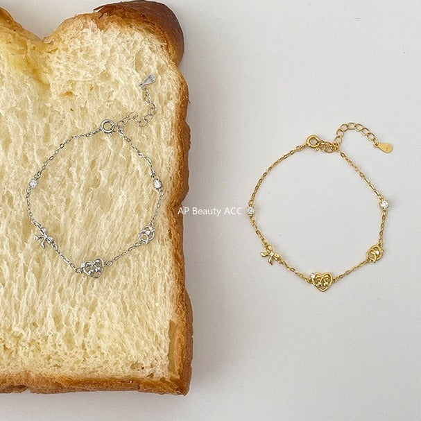 C廠-韓版愛心鹼水結手鍊女甜美小清新蝴蝶結純銀手飾小眾精緻設計飾品「SL-490」25.11-1