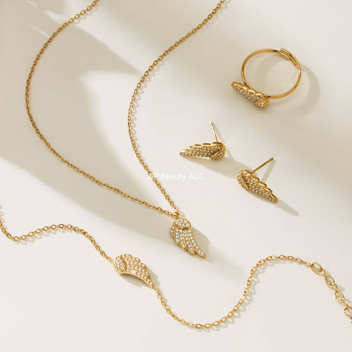 B廠-超閃5A鋯石小翅膀造型手鍊項鍊耳環戒指套裝不鏽鋼鍍18k金「TXP486」25.11-4